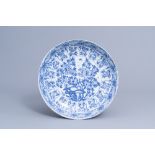 A Chinese blue and white charger with floral design, Kangxi