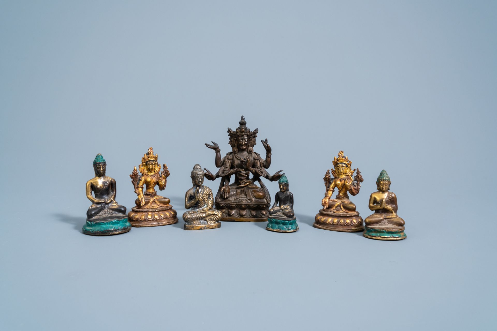 Seven bronze figures of Buddha and Tara, China and Southeast Asia, 19th/20th C.