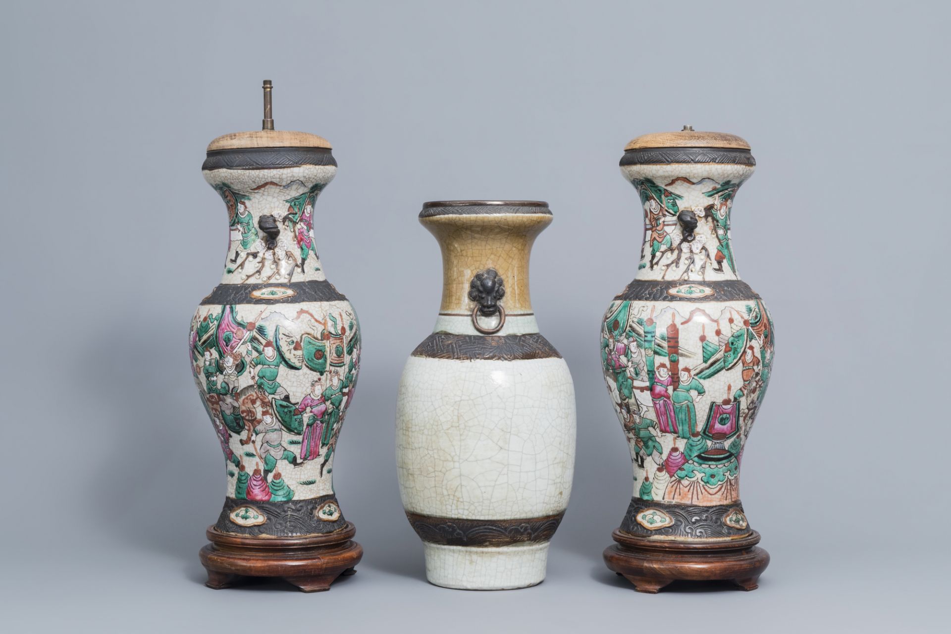 A pair of Chinese Nanking famille rose vases with warrior scenes & a Nanking celadon vase, 19th C. - Image 2 of 6