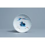 A Chinese wucai ko-sometsuke Japanese market saucer dish with a boy and a buffalo, Transitional peri