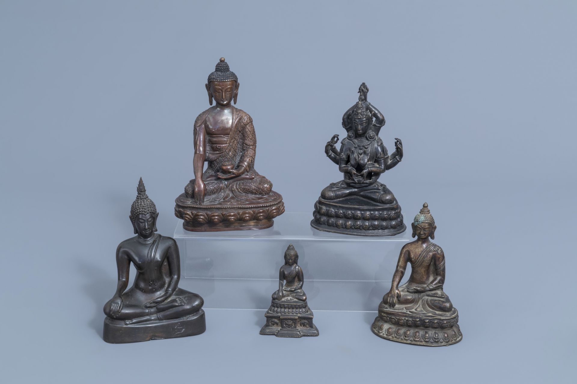 Five bronze figures of Buddha, China and Southeast Asia, 19th/20th C.