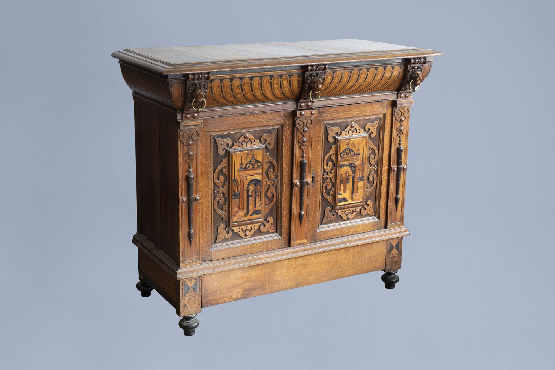 A Flemish oak wooden buffet dresser with architectural design and lion heads, partly 16th C. and lat