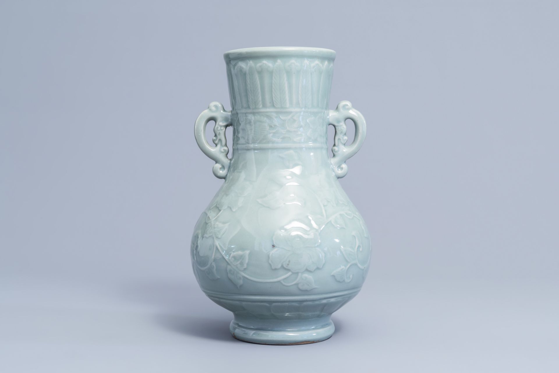 A Japanese celadon glazed 'lotus scroll' bottle vase, Edo/Meiji, 18th/19th C. - Image 3 of 6