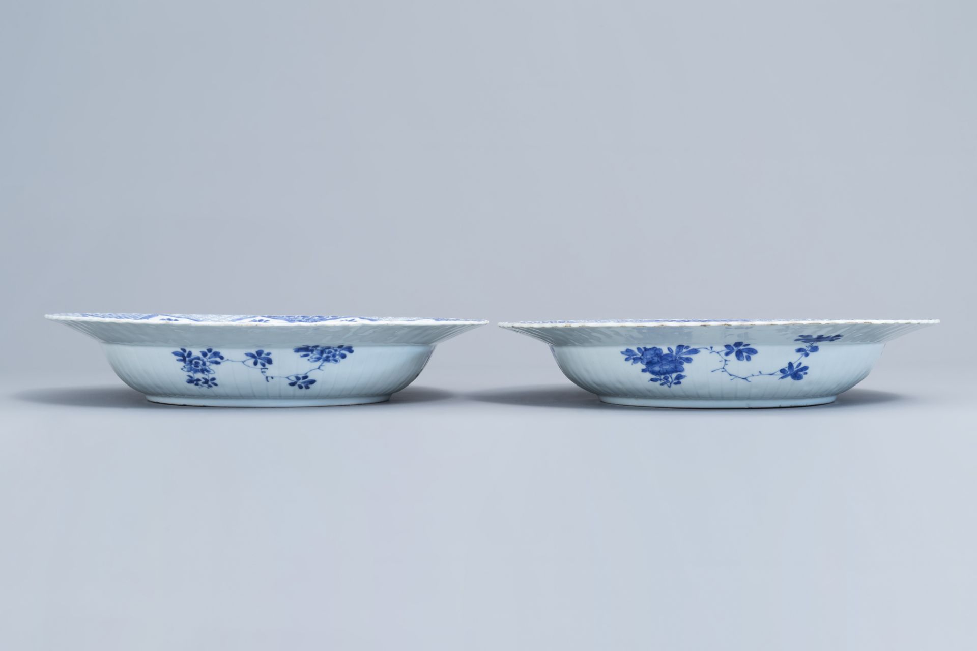 A pair of Chinese blue and white 'pheasant' chargers, Kangxi - Image 6 of 8