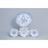 A large Chinese blue and white charger and three plates with floral design, Yongzheng/Qianlong