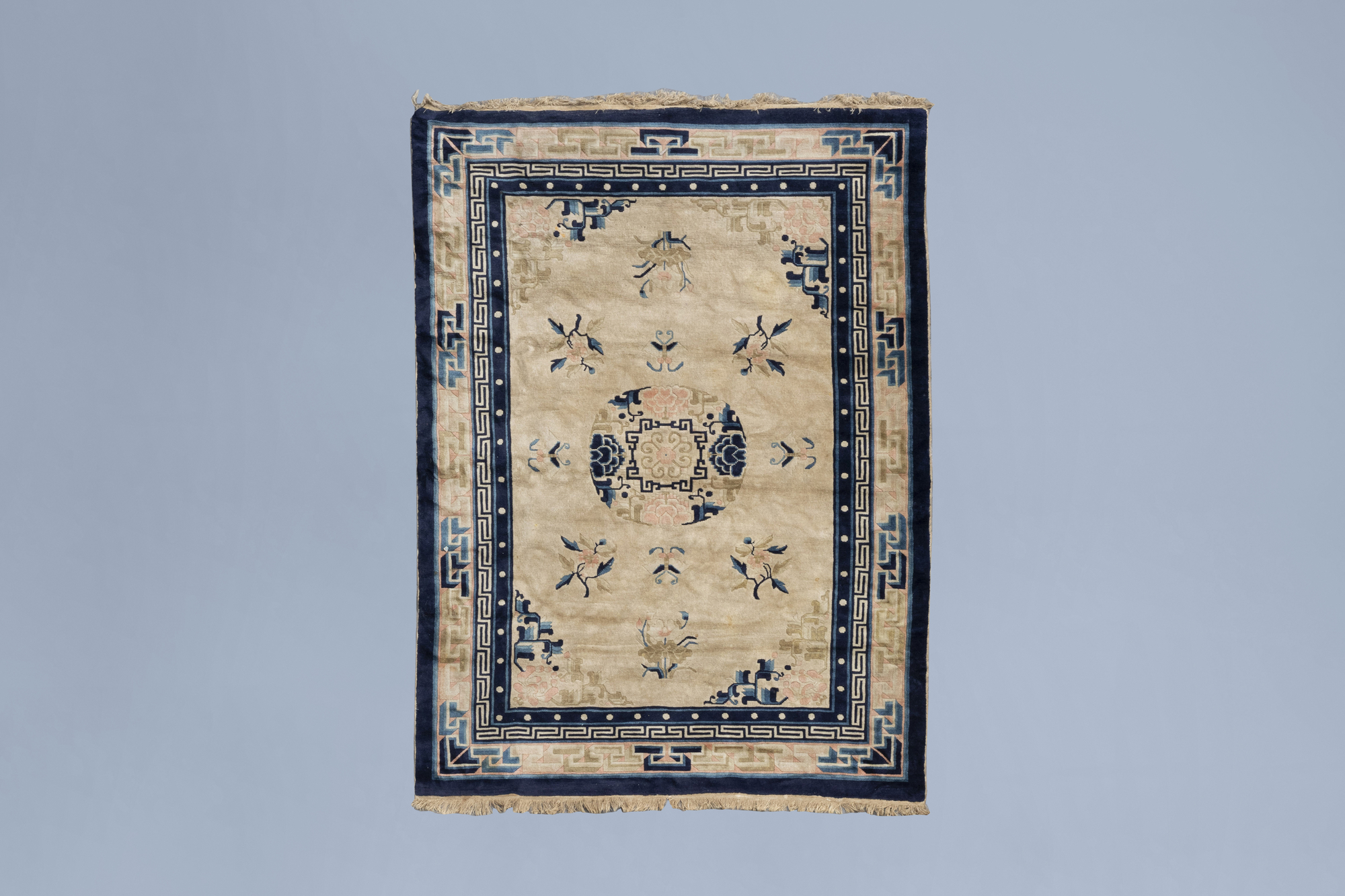 A Chinese 'Peking' rug with floral design, wool on cotton, first half of the 20th C.