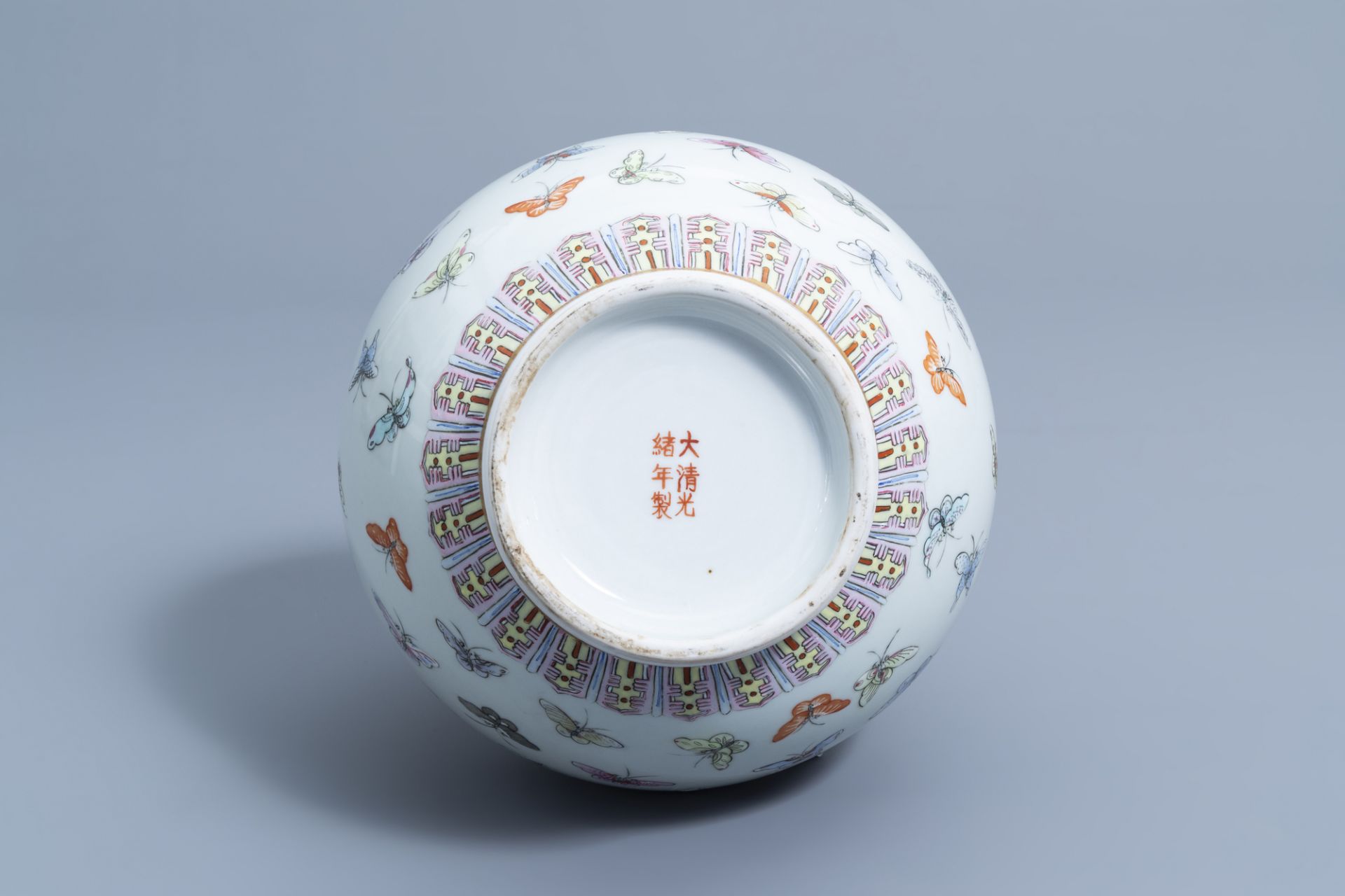 A Chinese famille rose '100 butterflies' bottle vase, Guangxu mark, 20th C. - Image 6 of 7