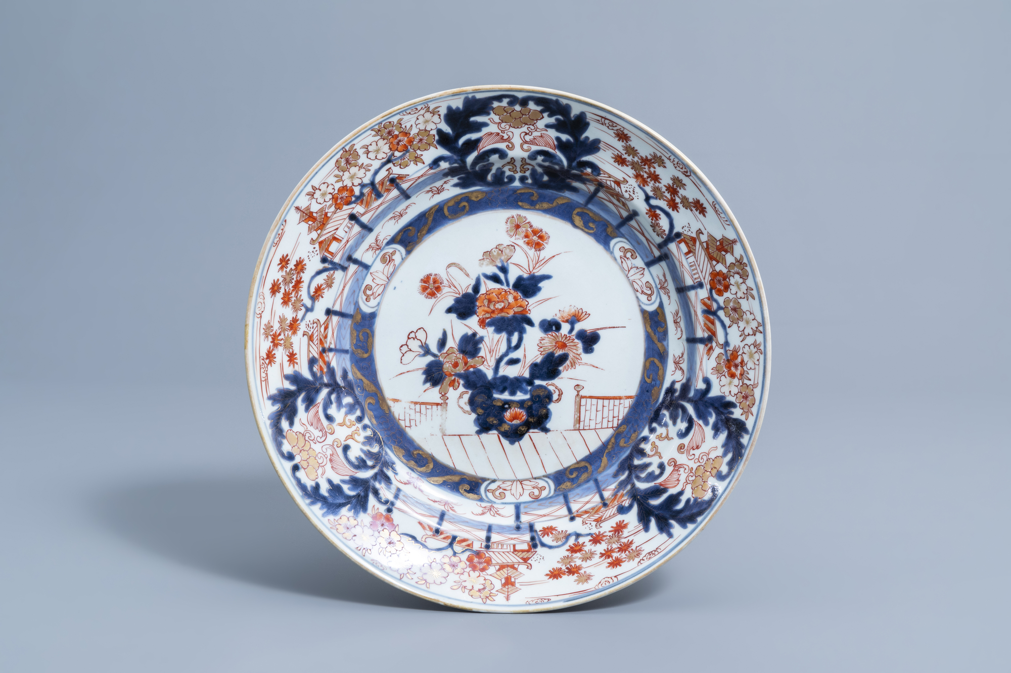 A Japanese Imari charger with a flower basket and floral design, Edo, 18th C.