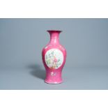 A Chinese famille rose ruby ground vase with floral design, Qianlong mark, Republic, 20th C.