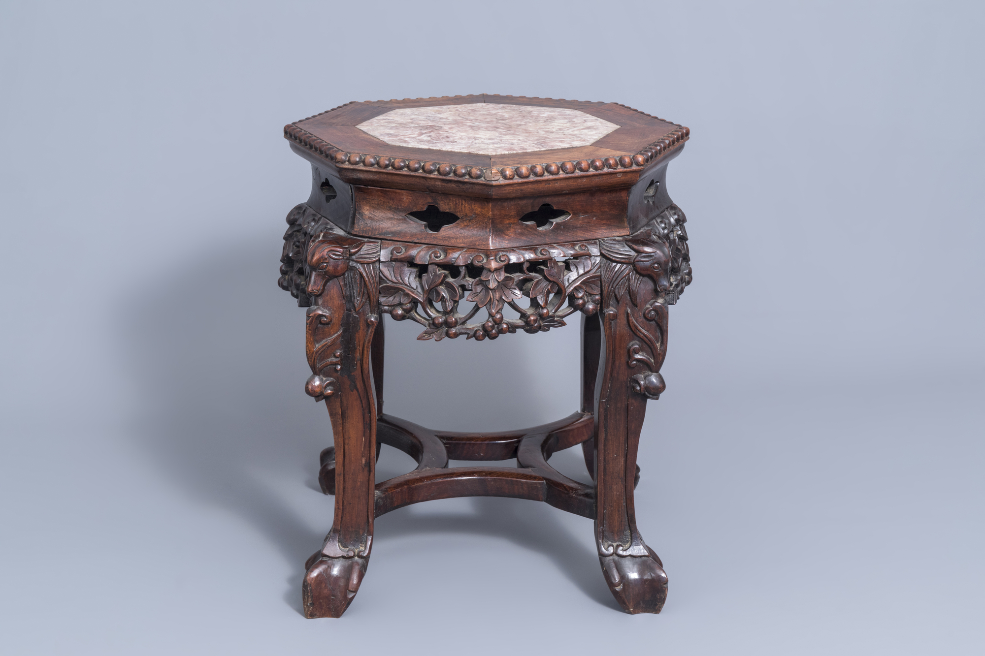 A collection of Chinese wooden stands and a carved wooden stand with marble top, 19th/20th C. - Image 9 of 14