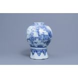 A large Dutch Delft blue and white 'chinoiserie' baluster vase, 17th C.