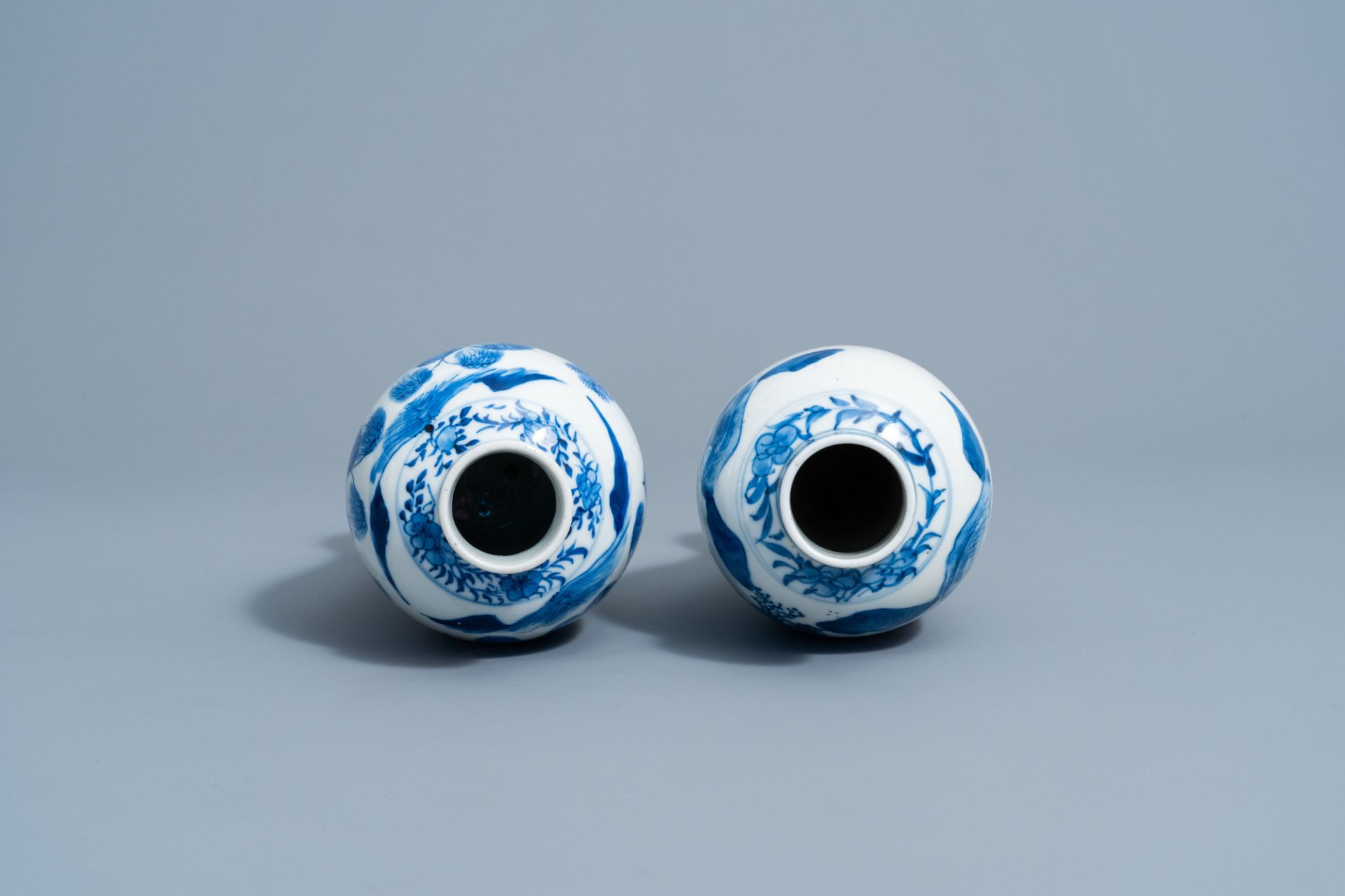 Two Chinese blue & white baluster vases with a mountain landscape, Kangxi mark, 19th C. - Image 5 of 6