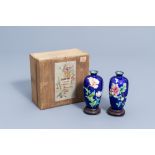 A pair of Japanese cloisonne vases with floral design, marked Hattori, Meiji, ca. 1900