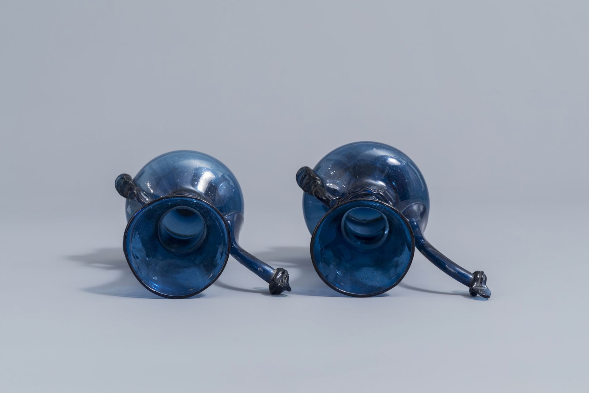 A pair of Islamic blue coloured relief decorated glass ewers or rosewater sprinklers, Qajar, Iran, 1 - Image 6 of 10