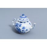 A fine Chinese blue and white teapot and cover with antiquities and floral design, Kangxi