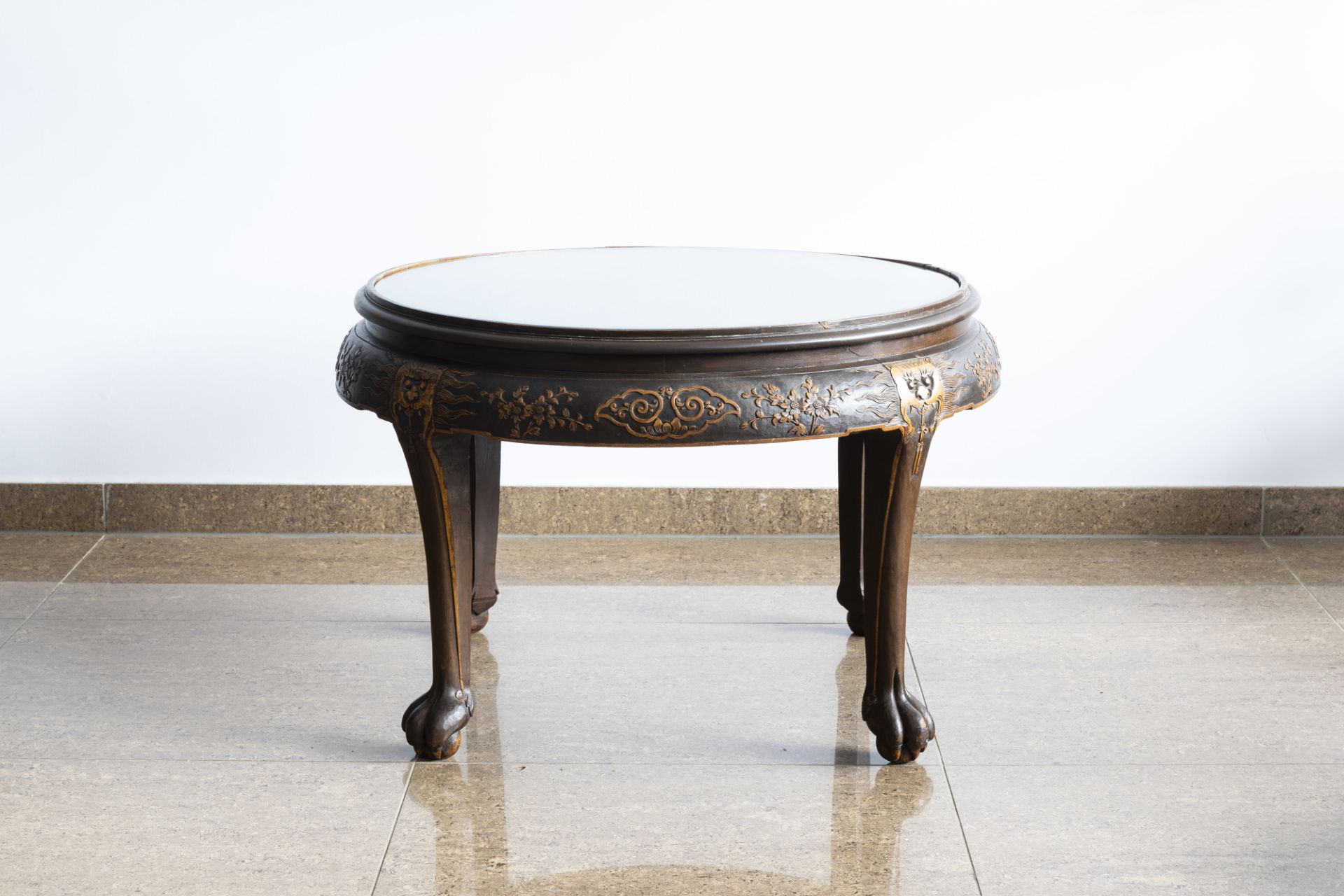 A Chinese wooden coffee table and four stools with relief design, 20th C. - Image 5 of 13