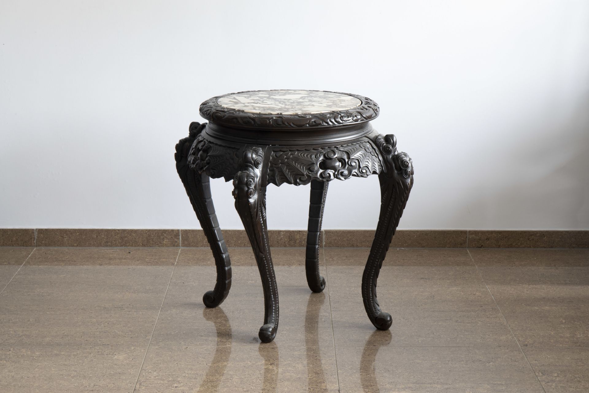 A Chinese or Japanese wooden table with marble top and dragon shaped legs, 20th C. - Image 2 of 7