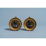 A pair of bronze Empire alto relievo plaques depicting the profile portraits of Napoleon and his wif