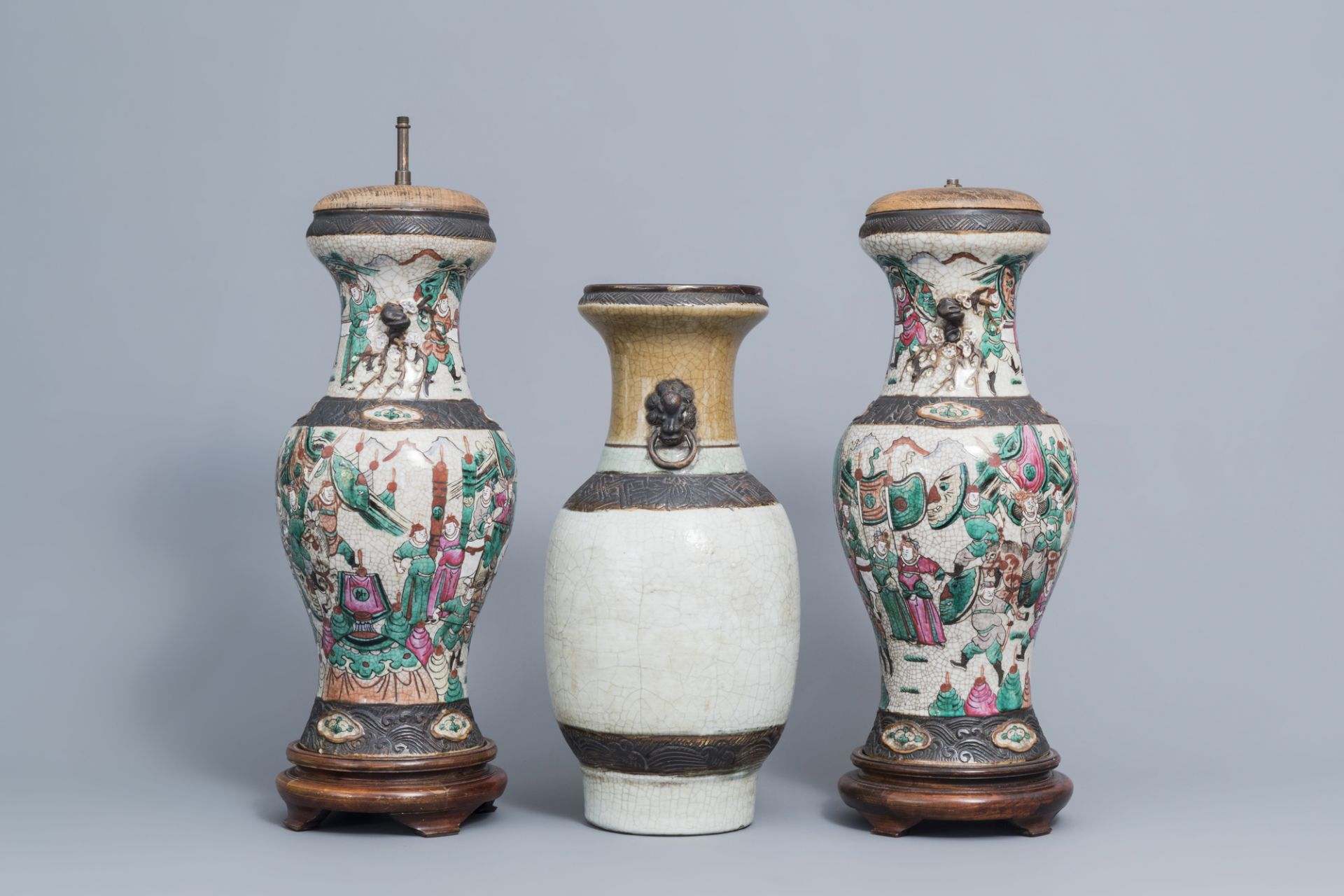 A pair of Chinese Nanking famille rose vases with warrior scenes & a Nanking celadon vase, 19th C. - Image 4 of 6