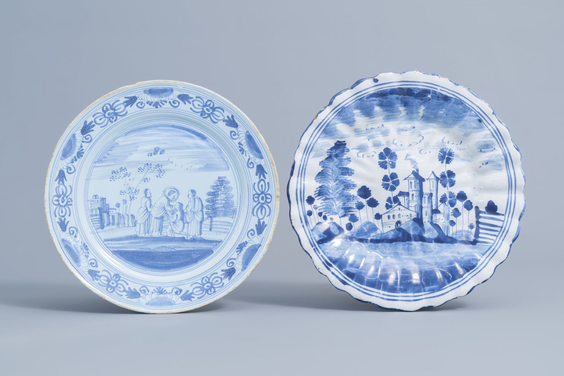 Two German blue and white plates with a landscape and a biblical scene, Ansbach and Nuremberg, 18th