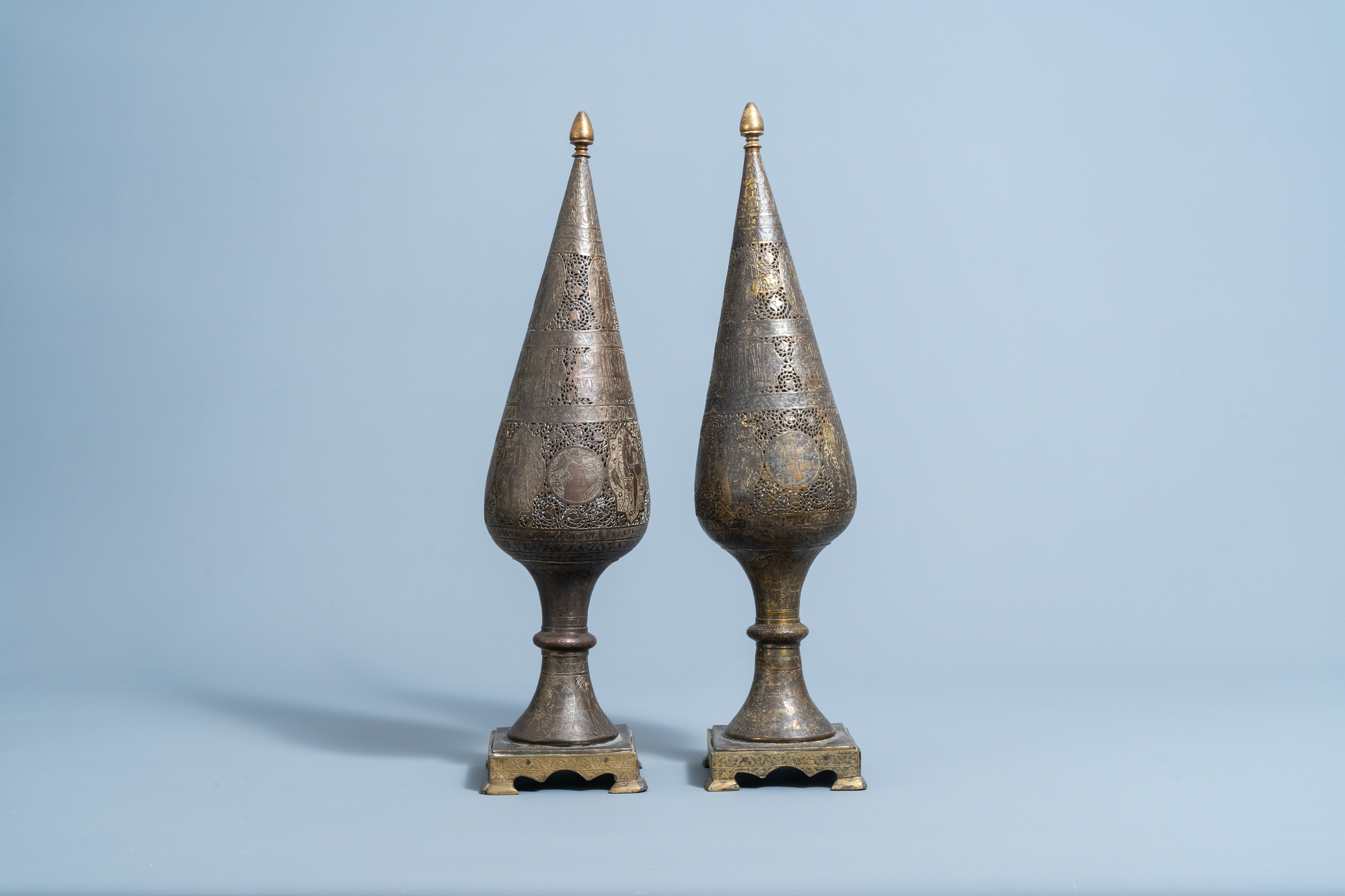 A pair of reticulated gilt bronze cone shaped ornaments with figures and calligraphy, Qajar, Iran, 1 - Image 3 of 7