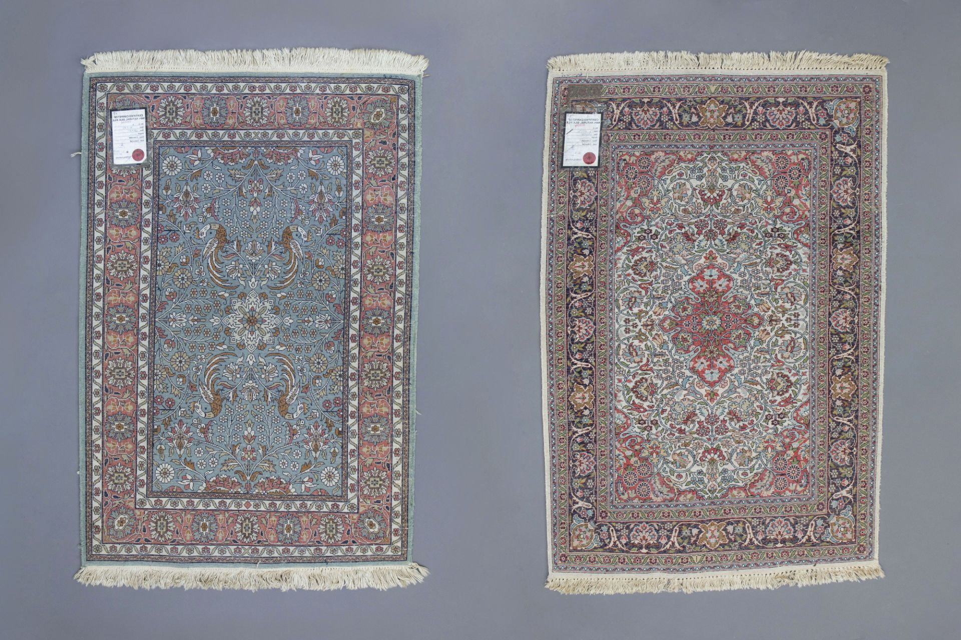 Two Oriental rugs with floral design, silk on cotton, 20th C. - Image 2 of 4