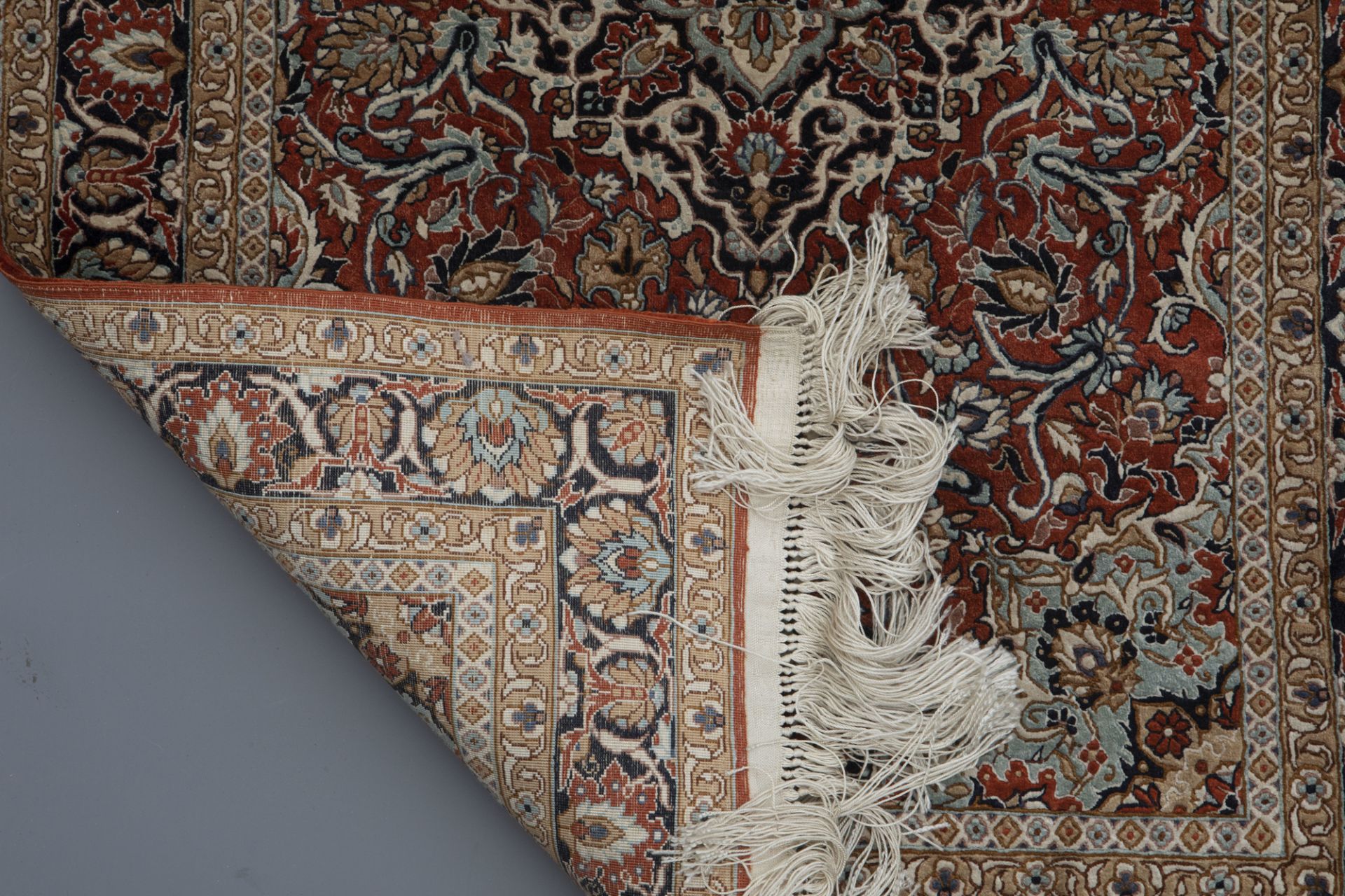 Three Oriental rugs with floral design and a central medallion, silk on cotton, 20th C. - Image 2 of 5