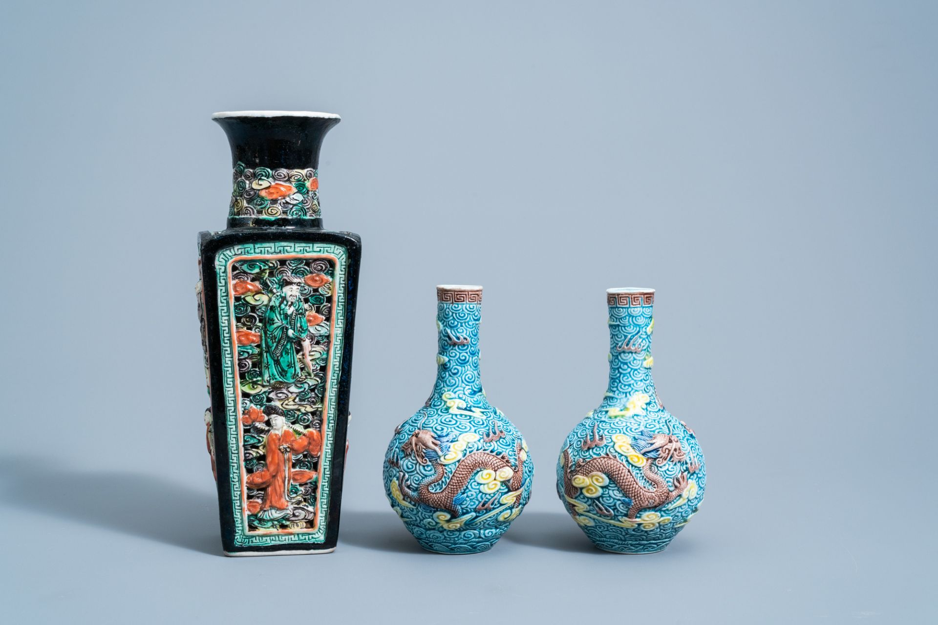 A pair of Chinese polychrome 'dragon' vases and a quadrangular 'Immortals' vase, 19th/20th C. - Image 4 of 7