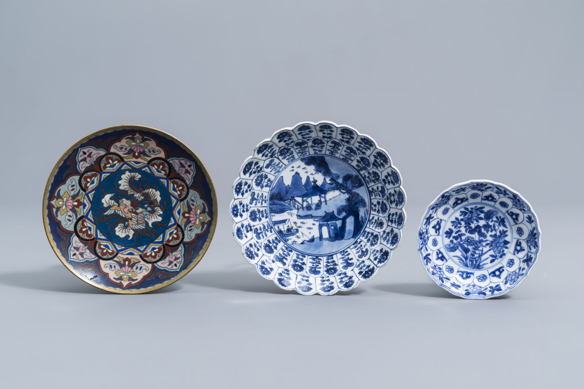 A varied collection of Chinese and Japanese blue, white, famille rose and Imari porcelain and a cloi - Image 6 of 9