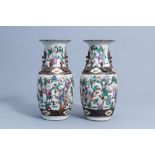 A pair of Chinese Nanking crackle glazed famille rose 'warrior' vases, 19th/20th C.