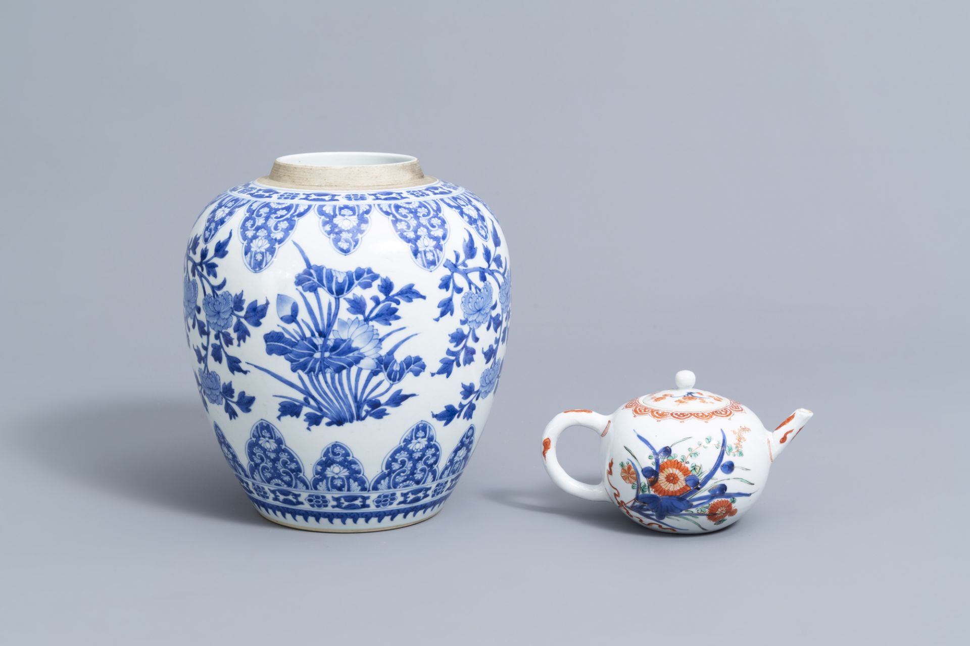 A Chinese blue and white jar and a verte-Imari teapot and cover with floral design, Kangxi and later