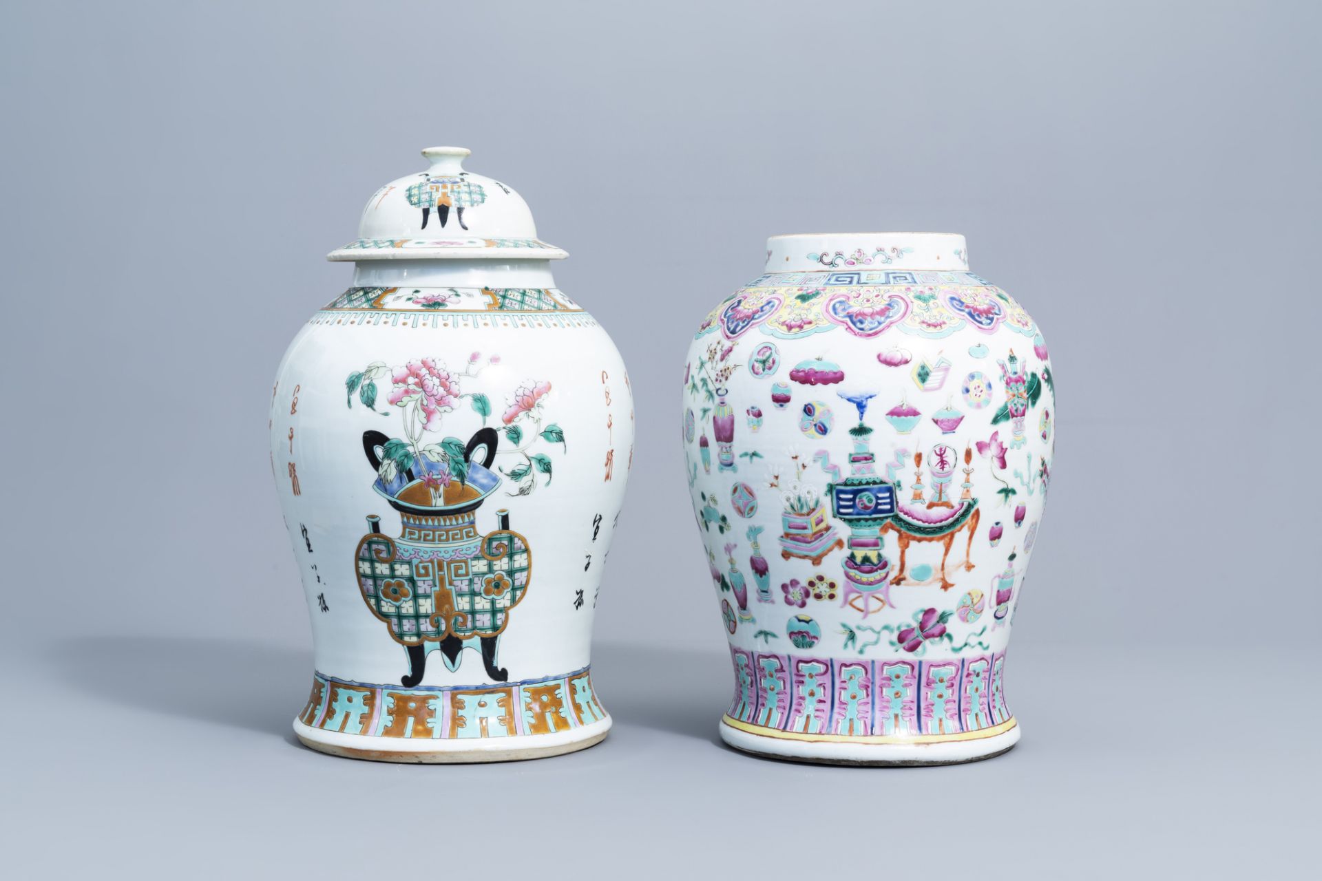 A Chinese famille rose vase and cover with a flower basket and an 'antiquities' vase, 19th C.