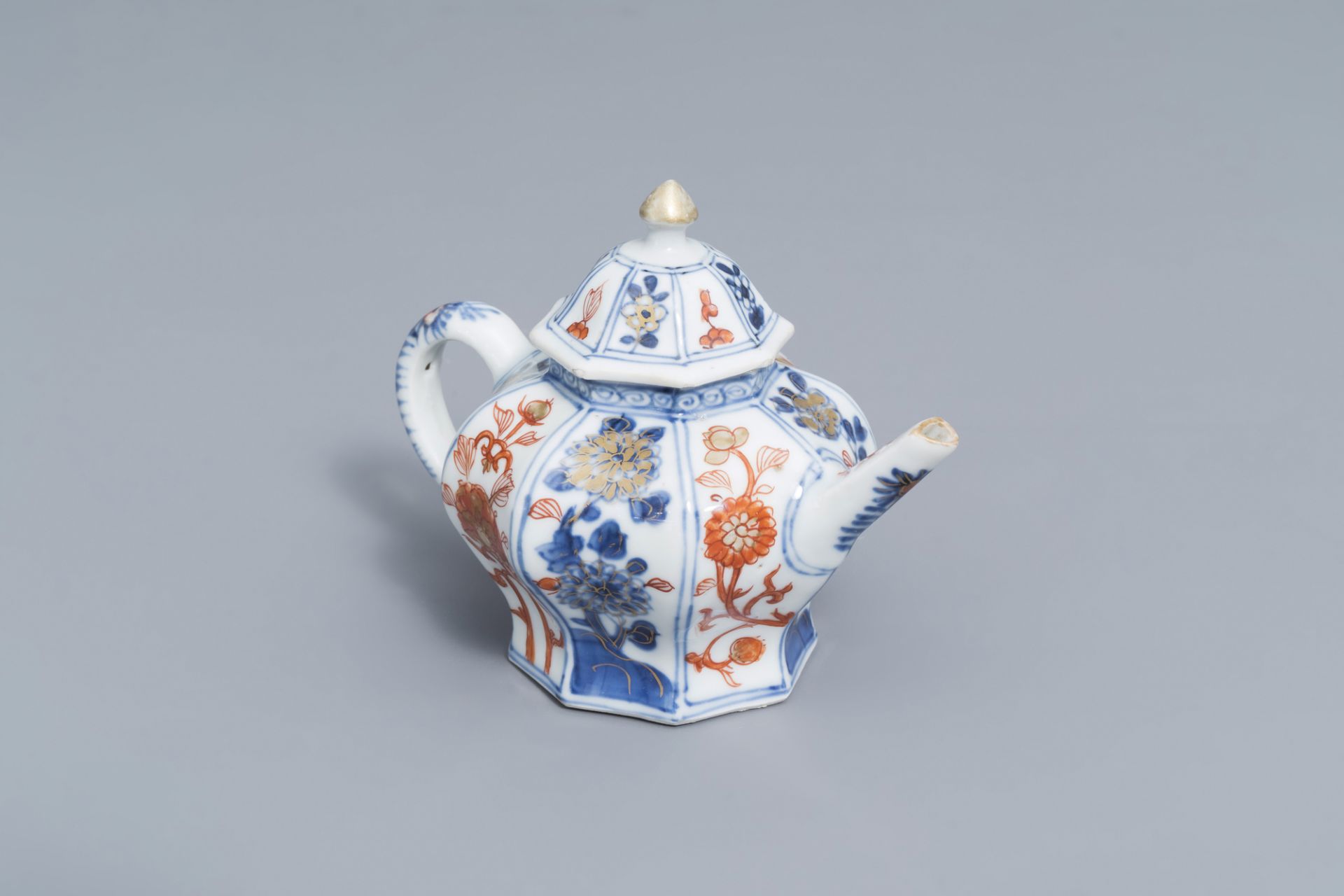 A Chinese octagonal Imari style teapot and cover with floral design, Kangxi