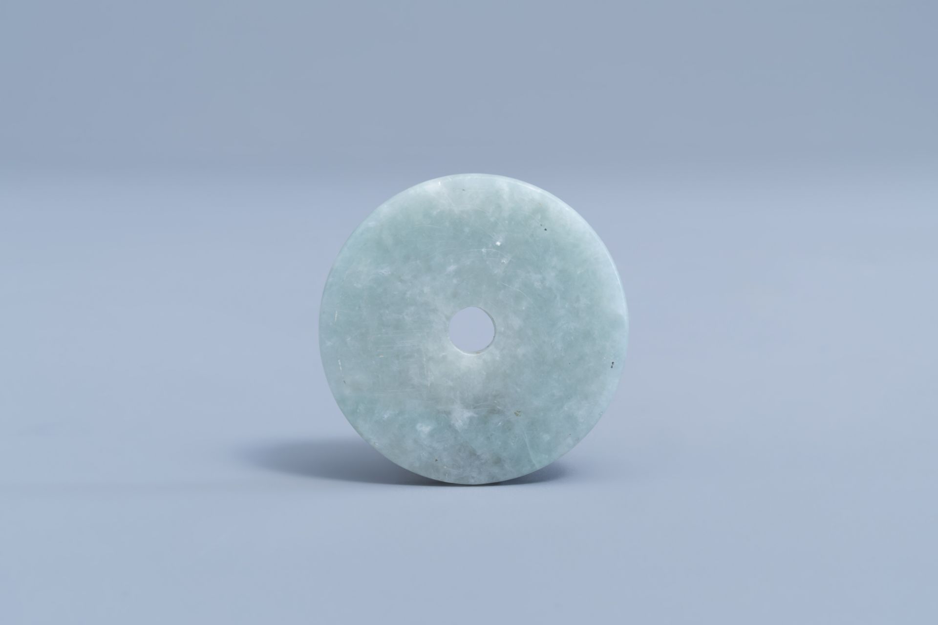 A Chinese pale celadon jade bi disc, 19th/20th C. - Image 2 of 8