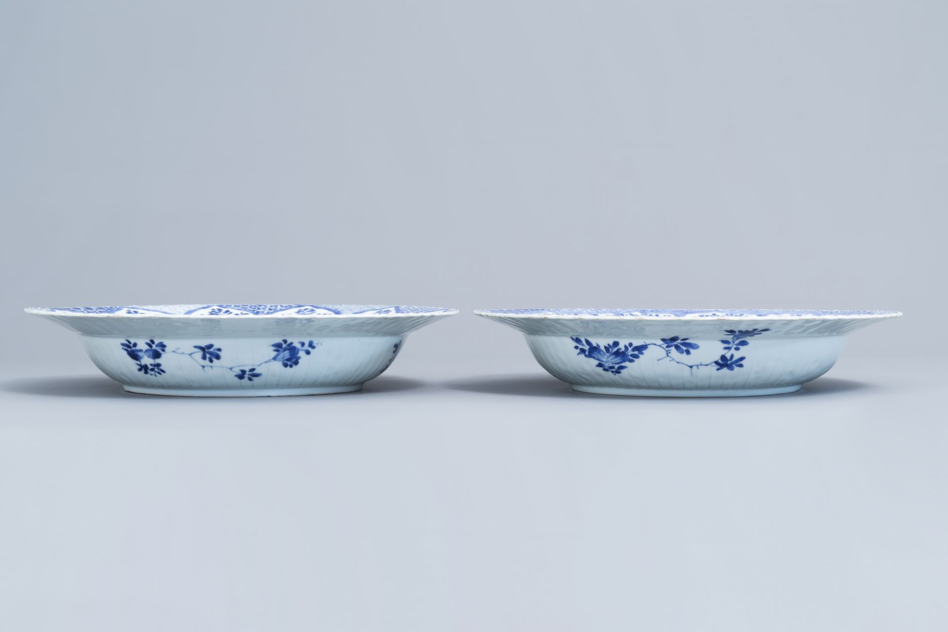 A pair of Chinese blue and white 'pheasant' chargers, Kangxi - Image 8 of 8