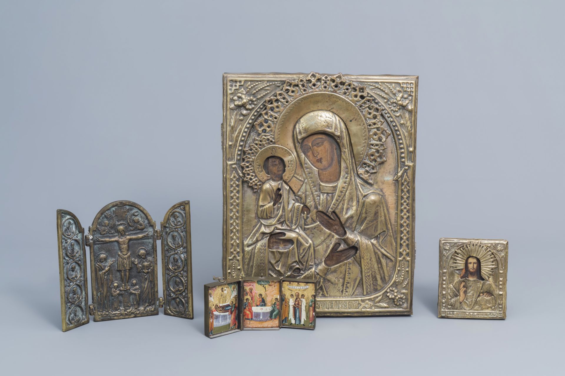 Two Russian icons with copper oklad or riza and two travel icons, 19th/20th C.