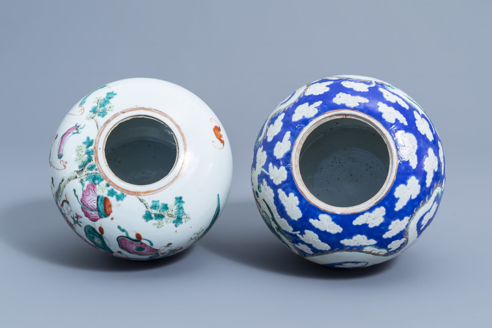 A Chinese famille rose jar and cover with figurative design and a blue ground 'dragon' jar, 19th C. - Image 6 of 9