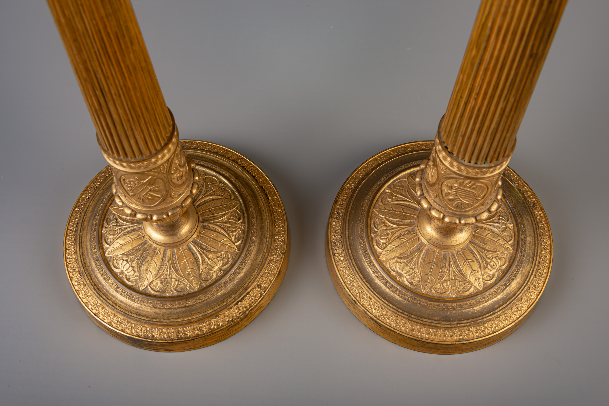 A pair of French Neoclassical gilt bronze candlesticks, 19th C. - Image 7 of 7