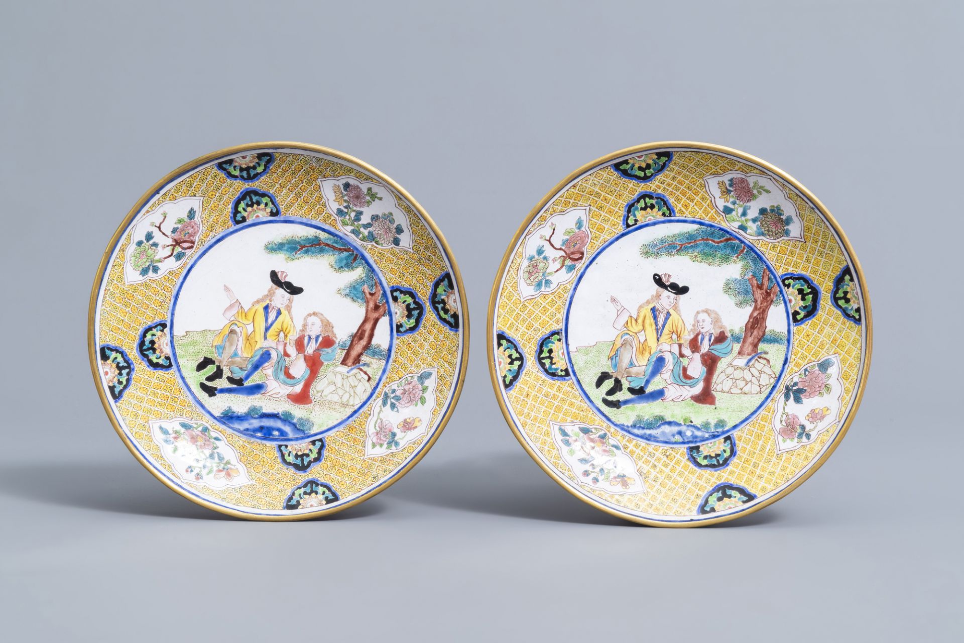 A pair of Chinese Canton enamel plates with European design, Qianlong/Jiaqing