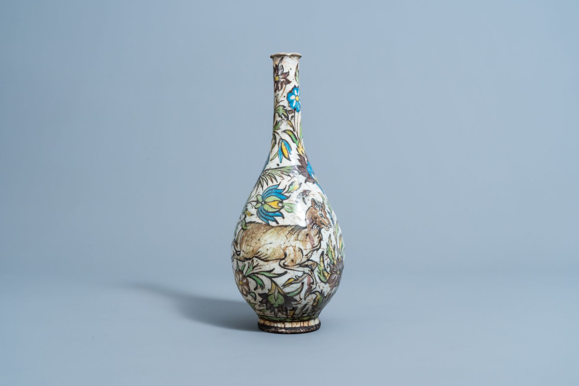A Qajar polychrome bottle shaped vase with animals and floral design, Iran, 19th C. - Image 3 of 6