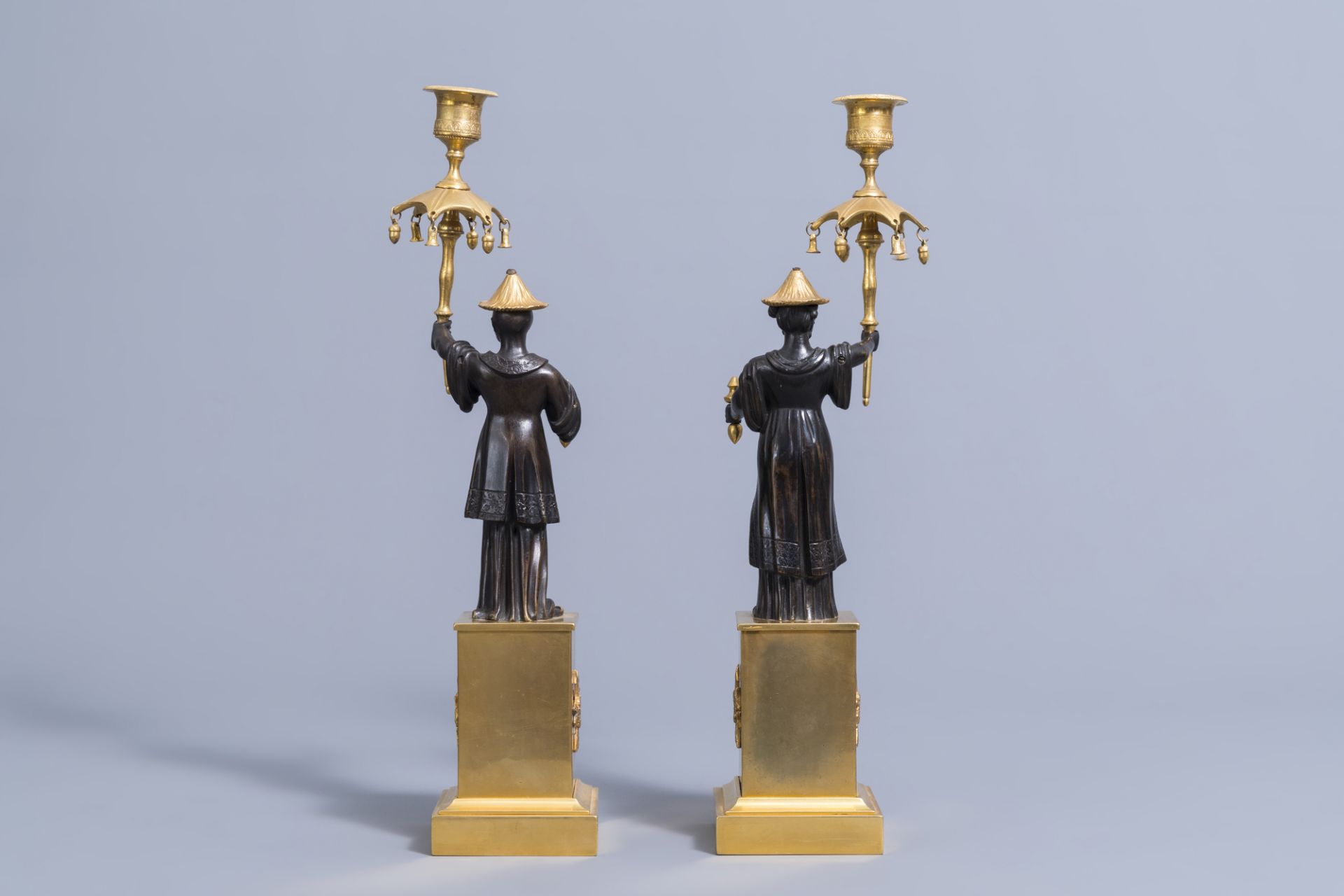 An extraordinary pair of French Empire style patinated bronze and ormolu chinoiserie candelabra, ear - Image 4 of 7