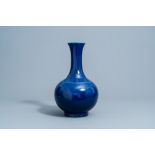A Chinese monochrome blue bottle vase, Guangxu mark, 19th/20th C.