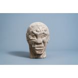 A Japanese stone head of a man formed by naked female bodies, Meiji, 19th/20th century