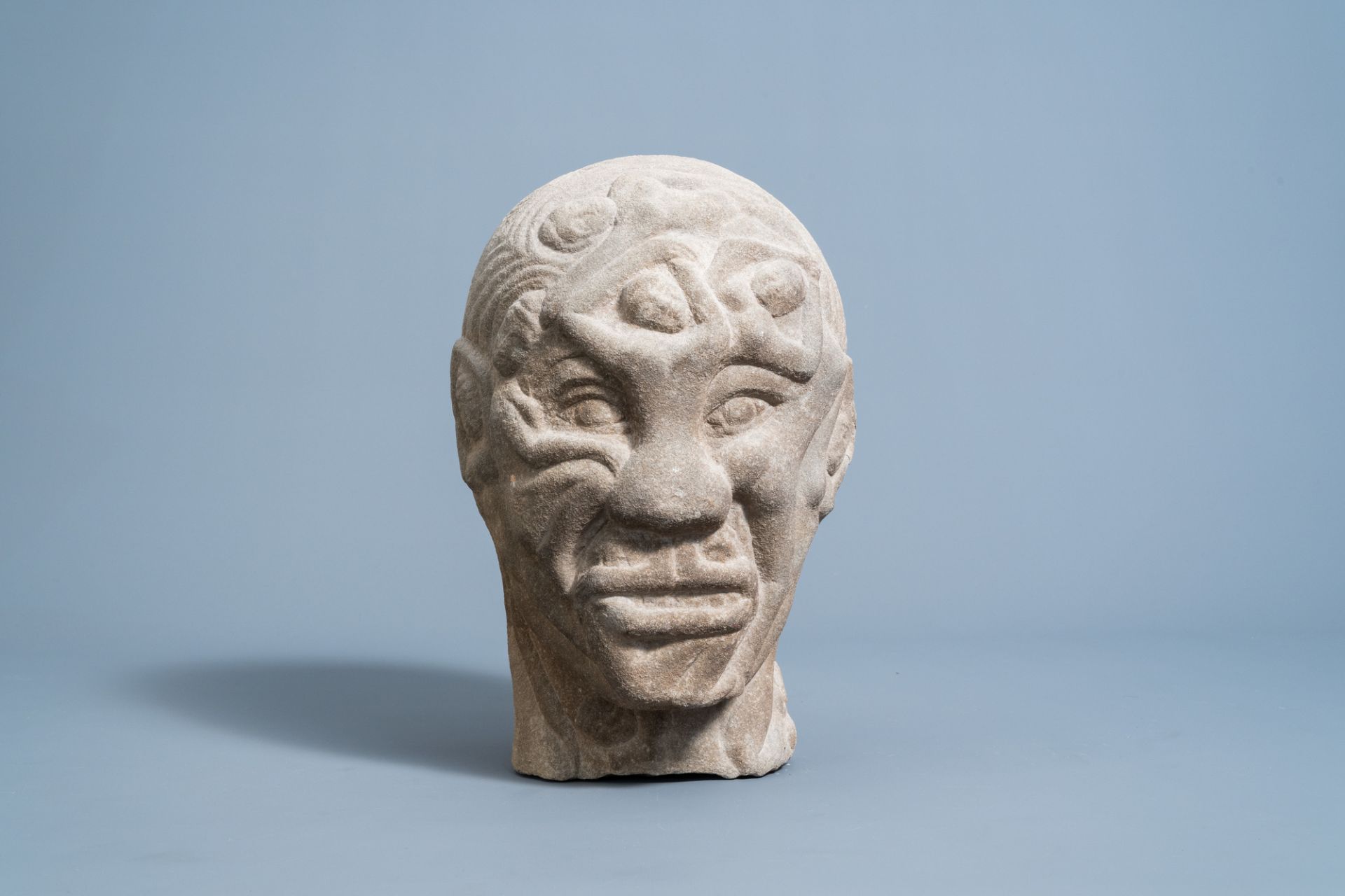 A Japanese stone head of a man formed by naked female bodies, Meiji, 19th/20th century