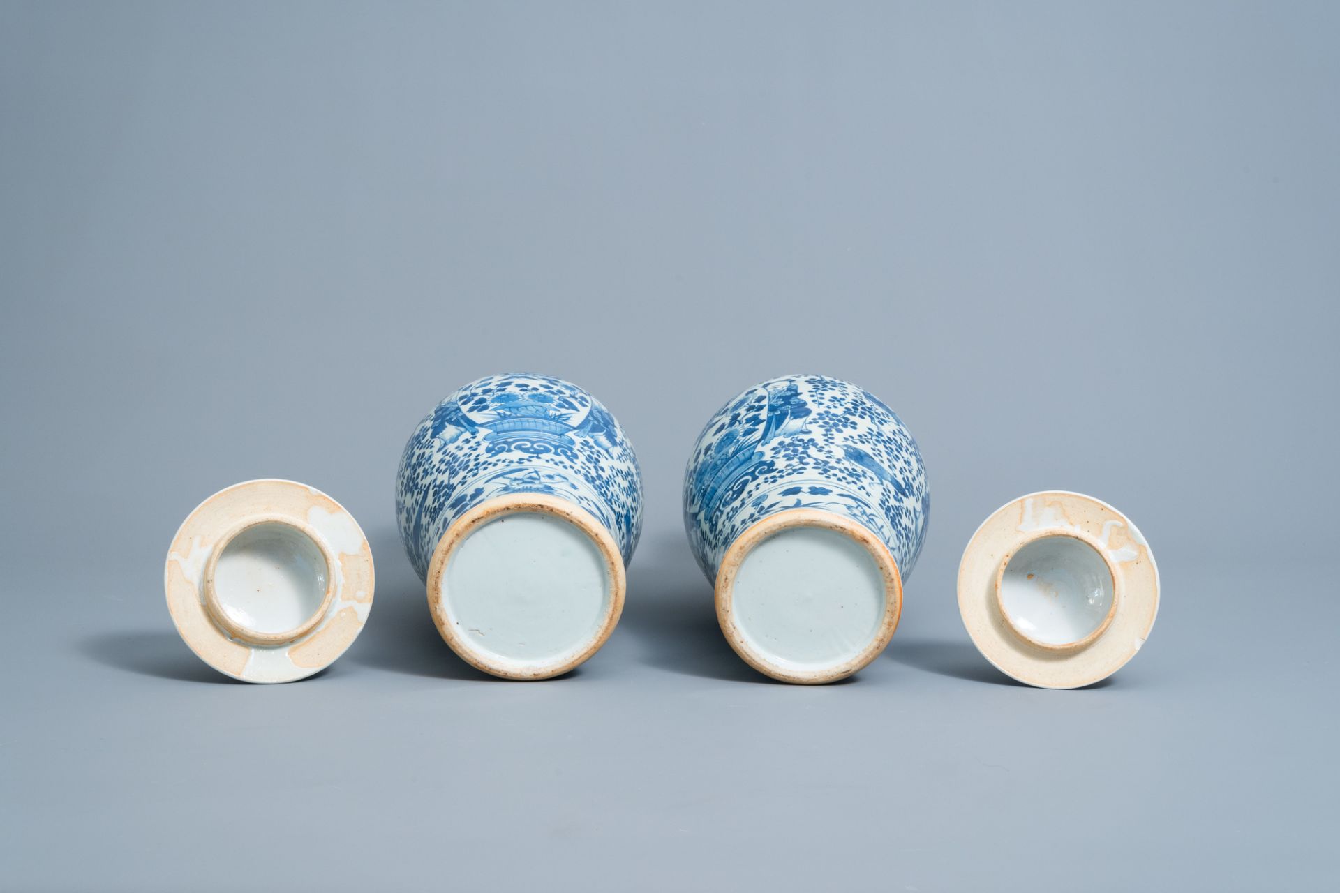 A pair of Chinese blue and white vases and covers with boys and antiquities, 19th C. - Image 6 of 6