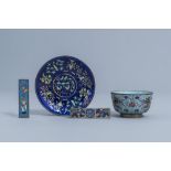 A Chinese cloisonne 'dragons' bowl, an enamel caucer with floral design and two small cloisonne scro