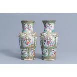 A pair of Chinese Canton famille rose baluster vases, 19th C.