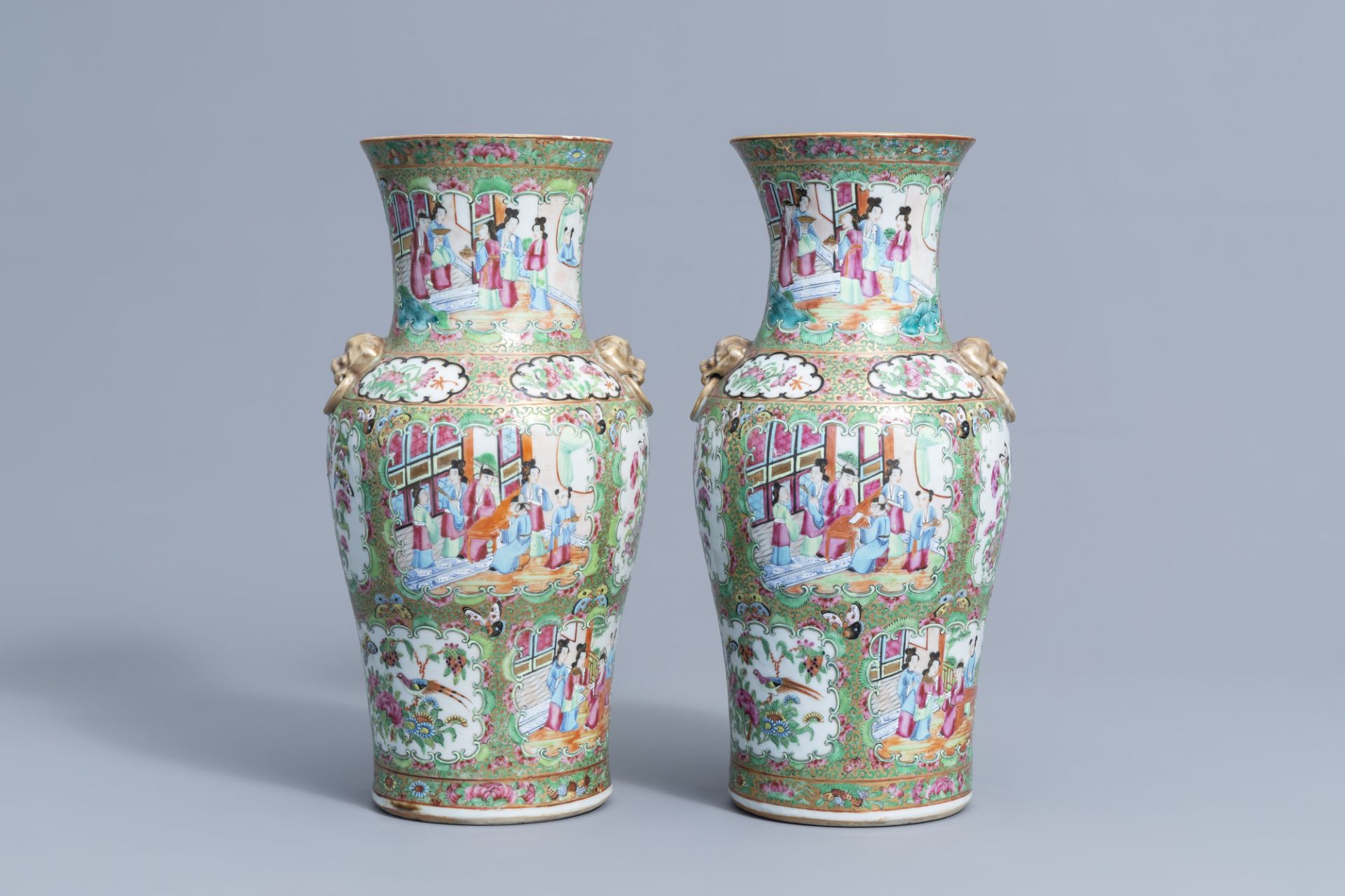 A pair of Chinese Canton famille rose baluster vases, 19th C.