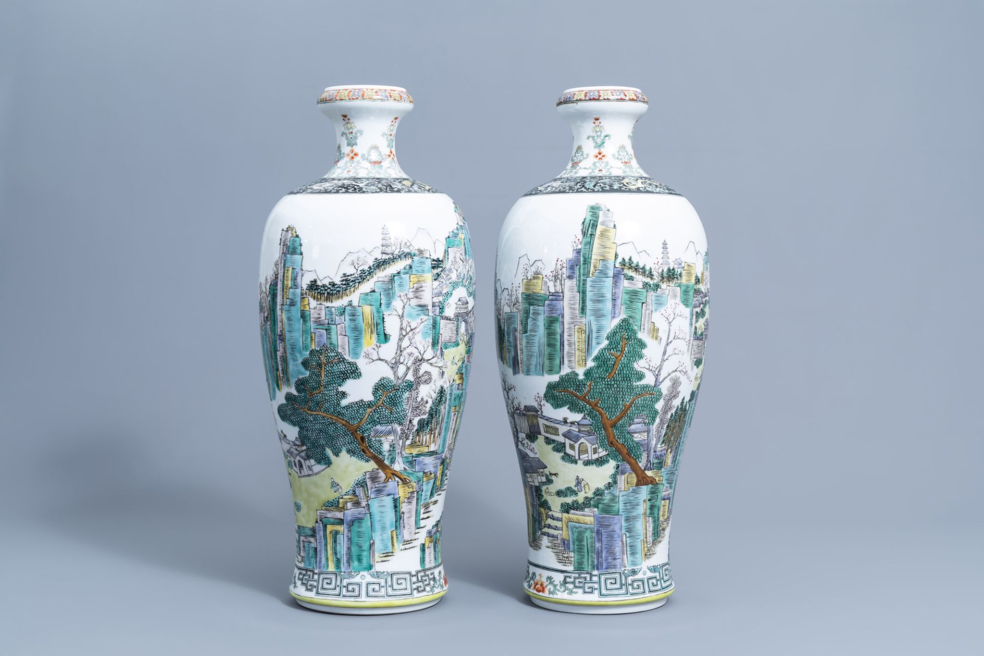 A pair of Chinese famille verte meiping vases with an animated landscape all around, 20th C. - Image 2 of 6