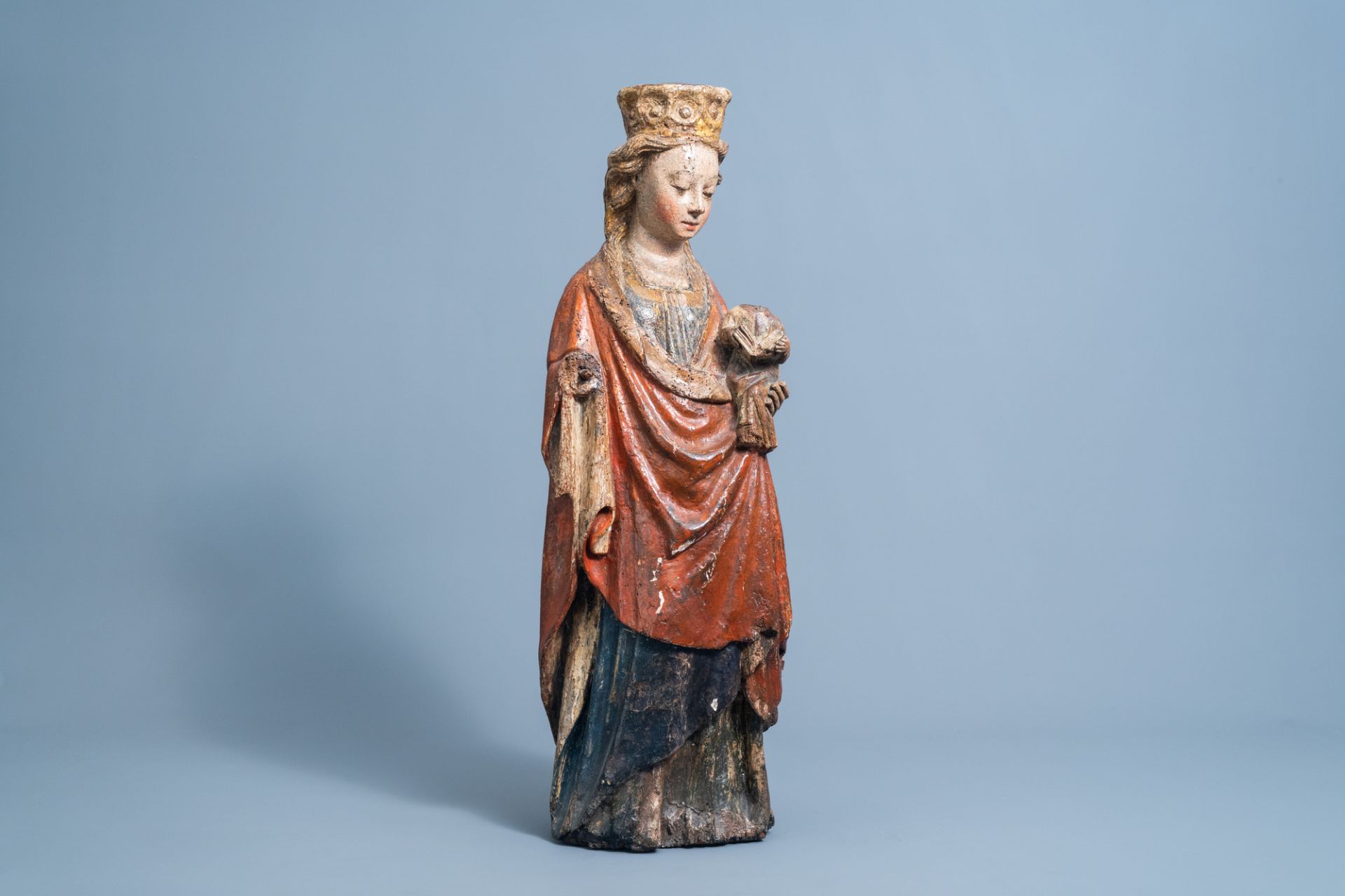 In the manner of the Master of Elsloo: A carved wooden and polychrome decorated Virgin and Child, po